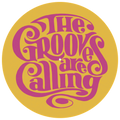The Grooves Are Calling yellow and magenta artwork felt DJ slipmat displayed on a Technics turntable