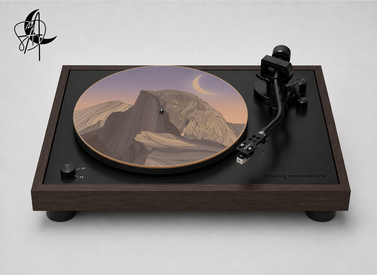 Half Dome line artwork beneath a twilight sky and crescent moon on a cork turntable platter mat